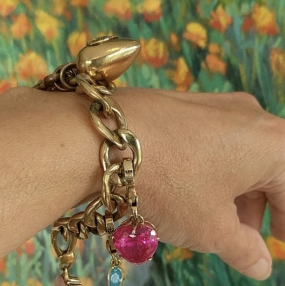 Juicy Couture Jewelry - Juicy Couture Bracelet with pink heart charm.